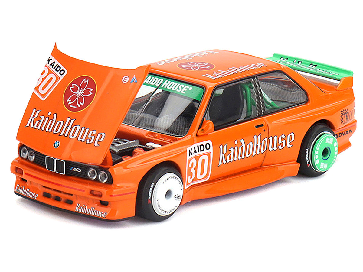 Front view of Mini GT BMW M3 KaidoHaus V1 #30 in orange by Mini GT