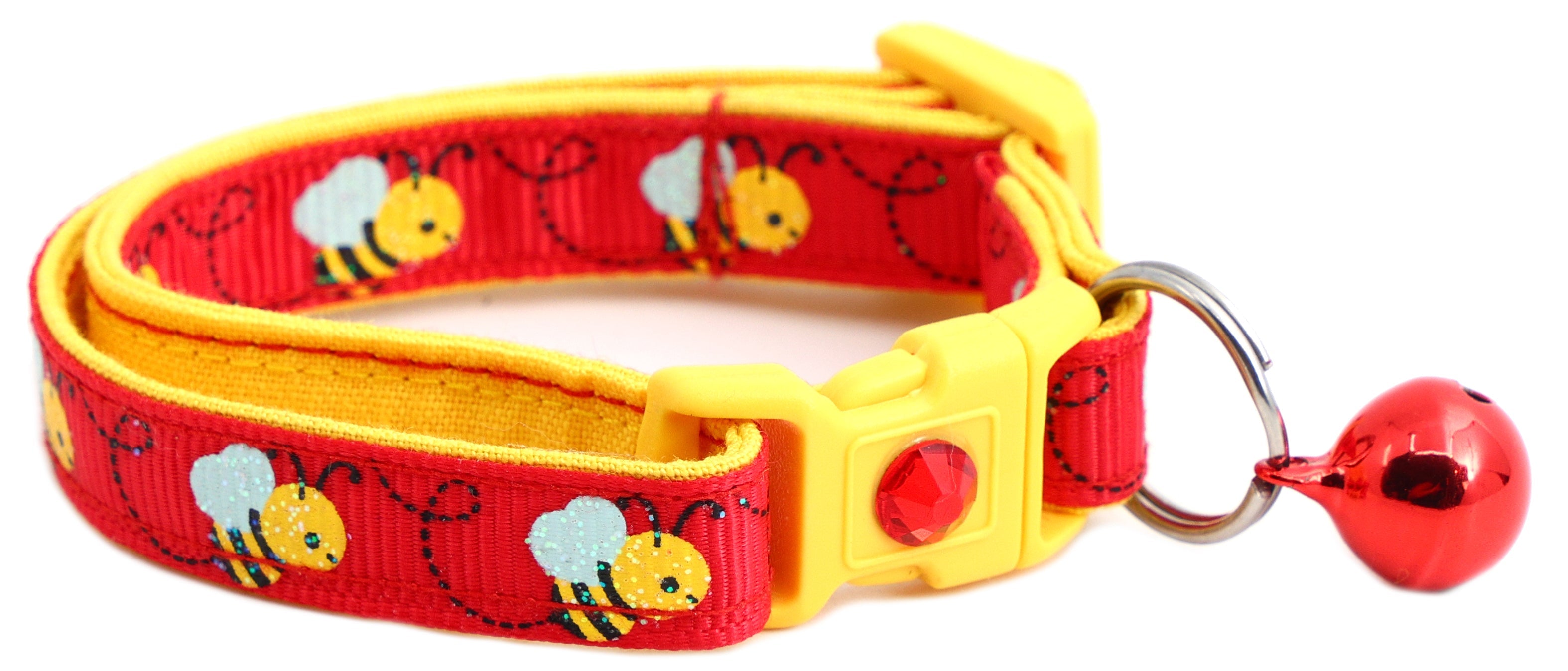 Vibrant Handmade Honey Bees Cat Collar next to a flower