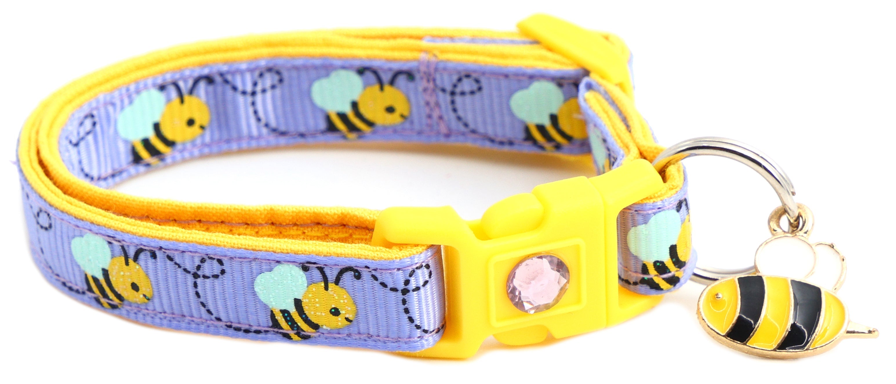 Cat playing with a ball while wearing Handmade Honey Bees Collar