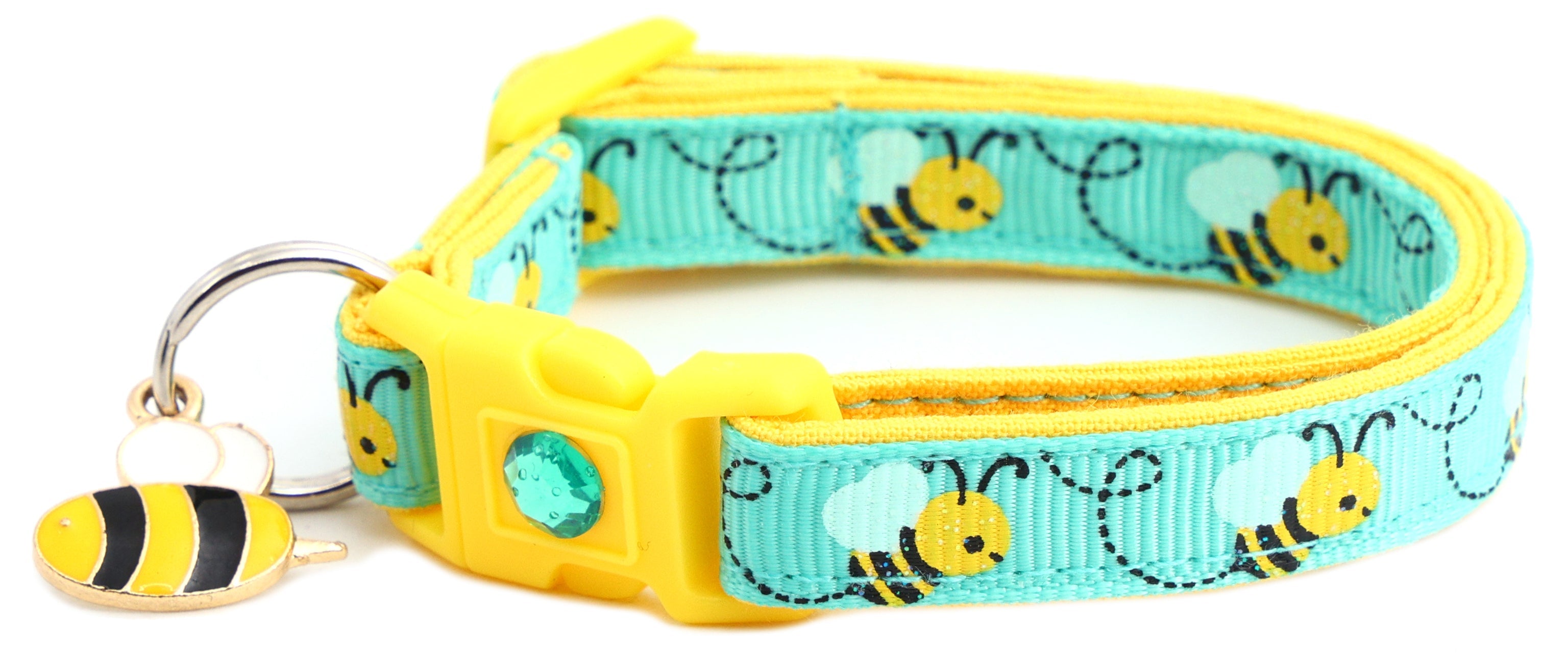 Cat lounging with Handmade Honey Bees Breakaway Collar on
