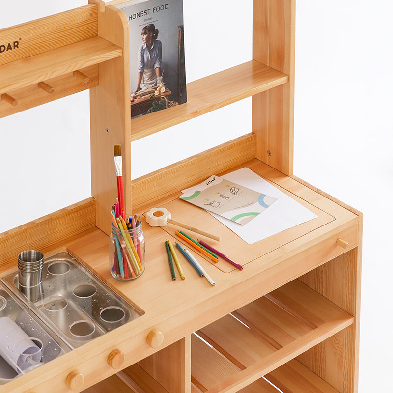 Side view of AVDAR Mud Kitchen 2.0 in a backyard setting