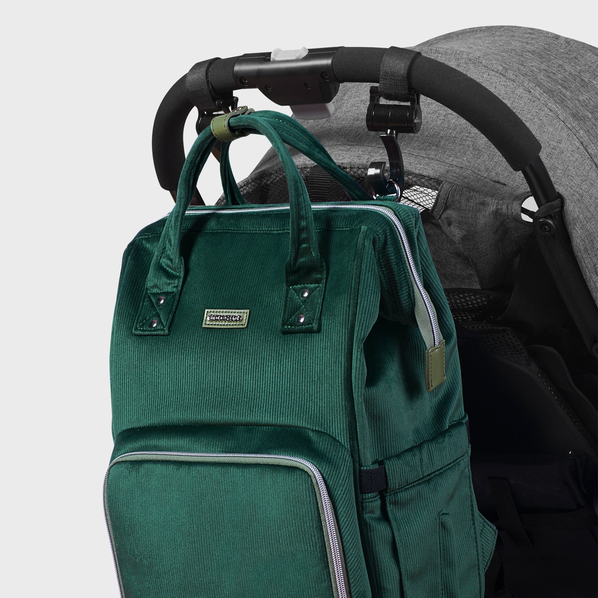 Side view showcasing the pockets of SUNVENO Corduroy Diaper Backpack