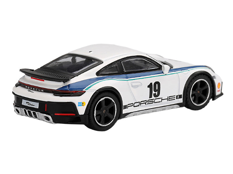 Close-up of Limited Edition Porsche 911 Dakar #19 Diecast Model's rubber tires