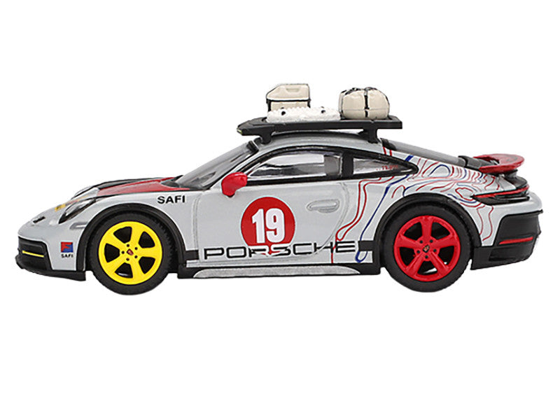 Close-up of wheel details on Porsche 911 Dakar #19 diecast model