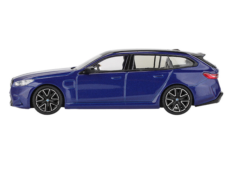 Close-up of wheels on BMW M5 Touring diecast model in Marina Bay Blue
