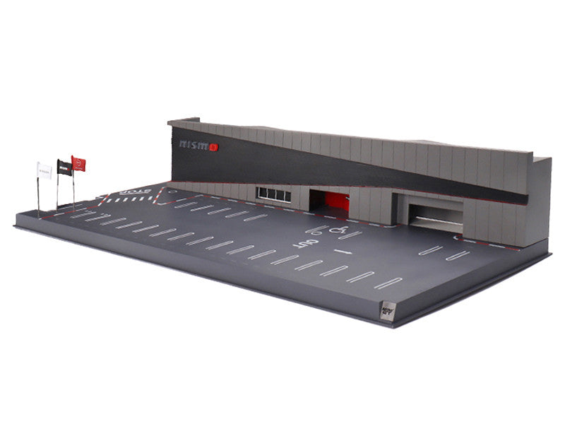 Side angle of NISMO Operation Diorama showcasing details by Mini GT
