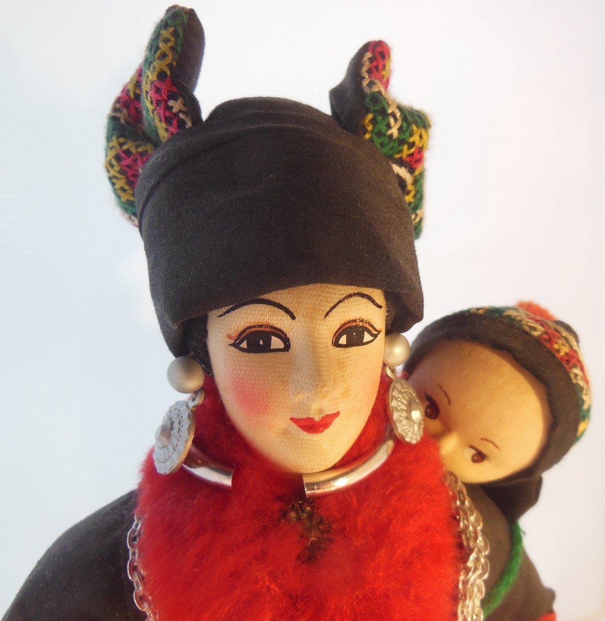Front view of Vintage Hmong Mother and Baby Doll showcasing intricate details