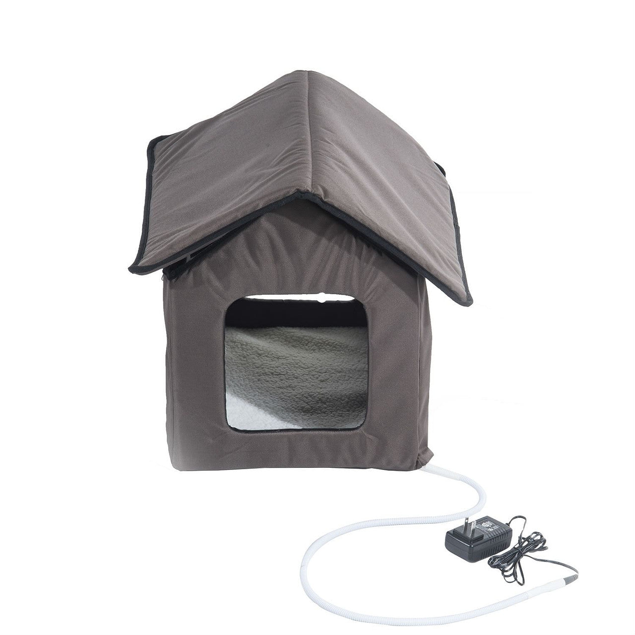 Cozy interior of Heated Outdoor Cat House with plush lamb wool bedding