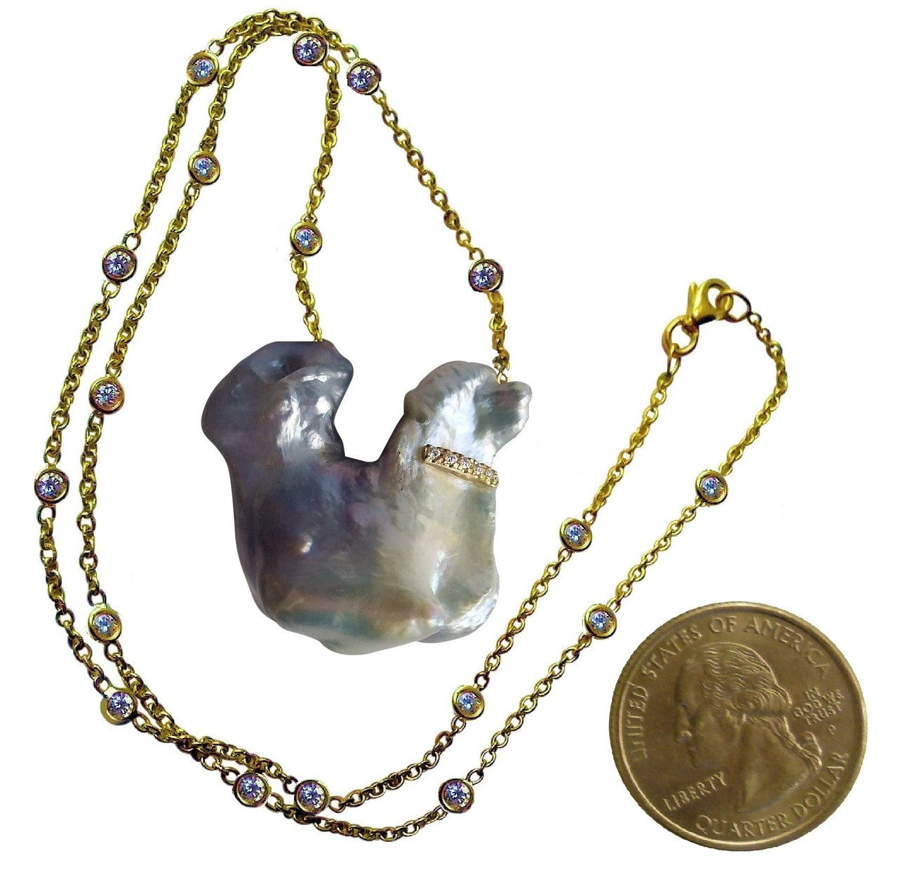 Lifestyle shot featuring the Jumbo Poodle Pearl Necklace worn by a model