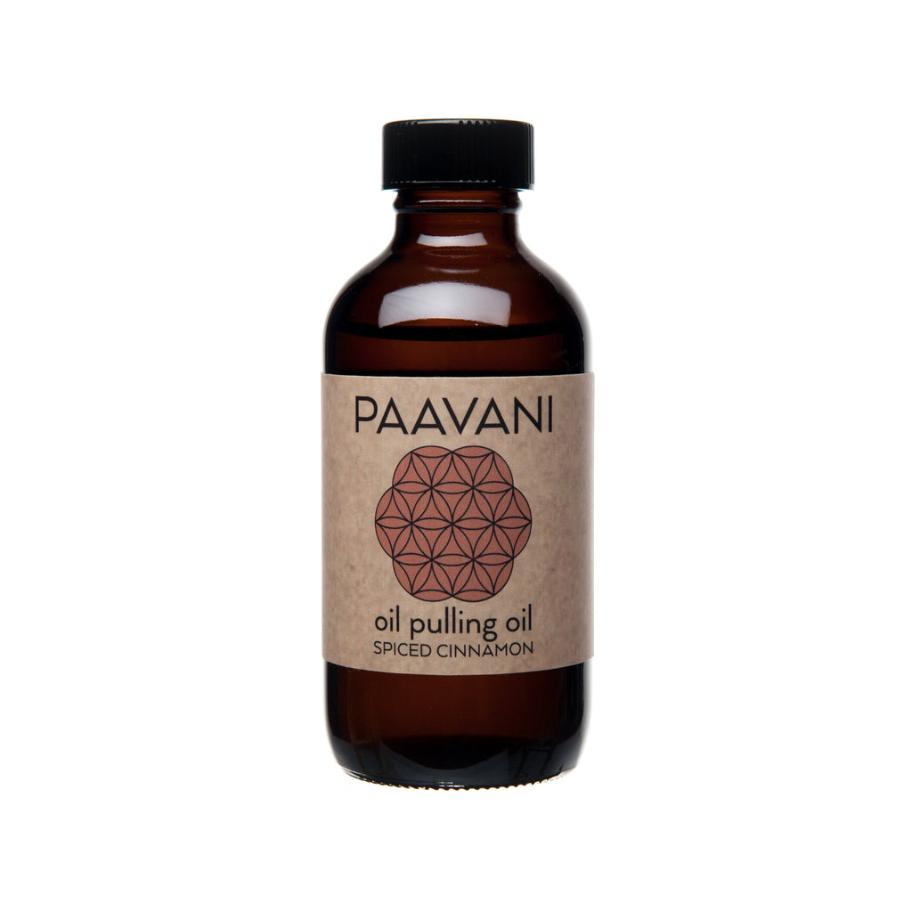 Bottle of Ayurvedic Cinnamon Pulling Oil for Oral Health by Gobingya