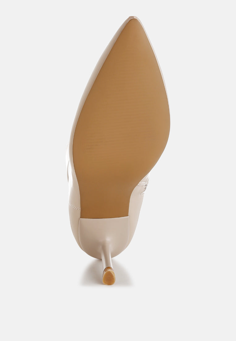 Close-up of the faux leather material on Pumila Stiletto Heel Sock Boots