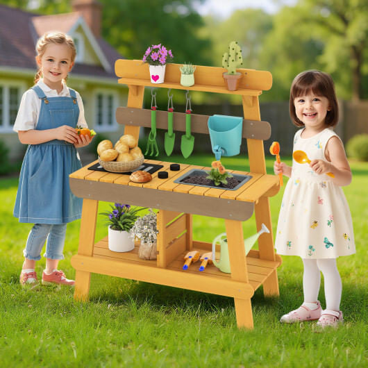 Kids playing with Gobingya Outdoor Wooden Mud Kitchen in a garden setting