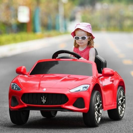 Gobingya Pink 12V Maserati Kids Ride-On Car parked in a garden