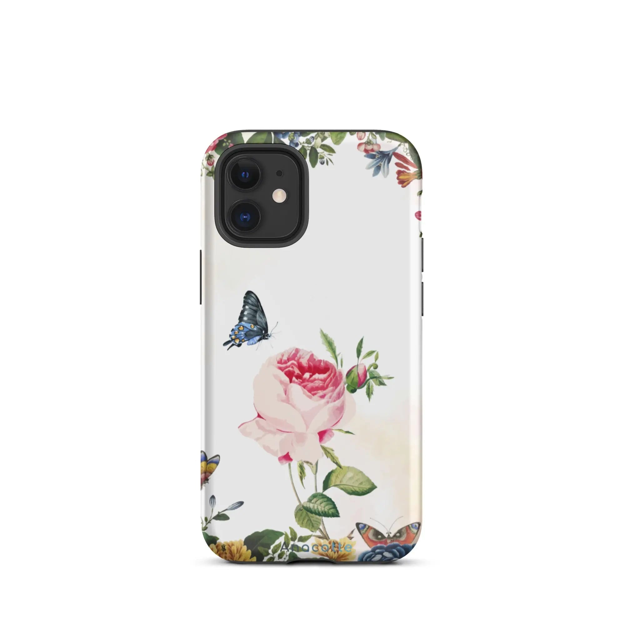 Vibrant Flower & Butterfly iPhone Case in hand against a nature backdrop