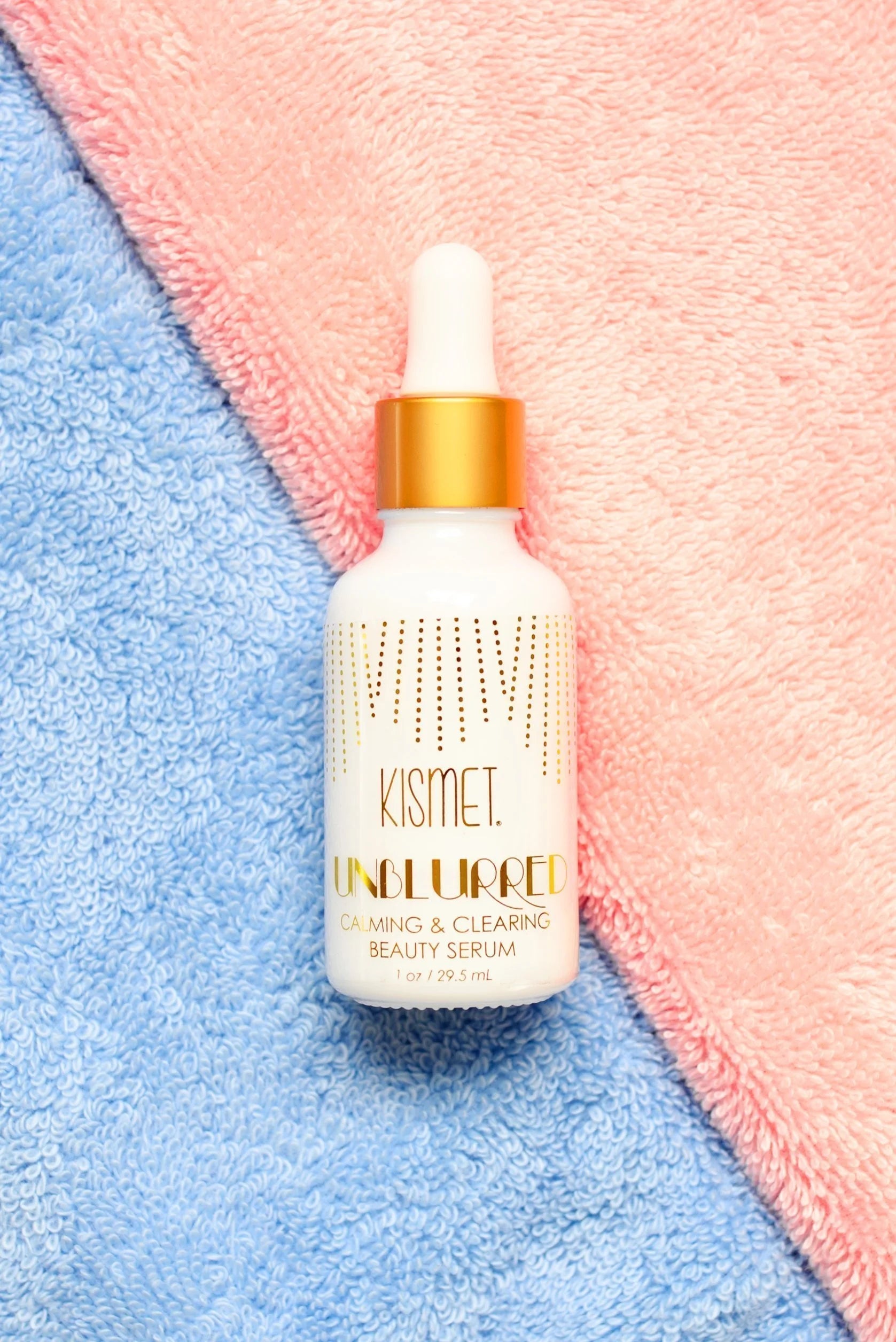 Front view of Kismet Unblurred Calming Serum in bottle with pump