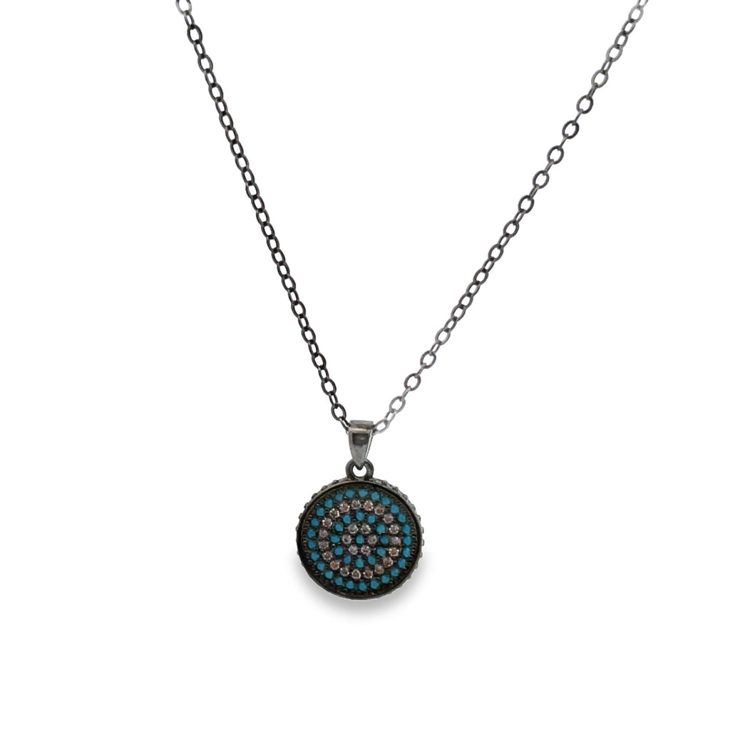 Elegant display of Coin Medallion Necklace with blue stones on a white background