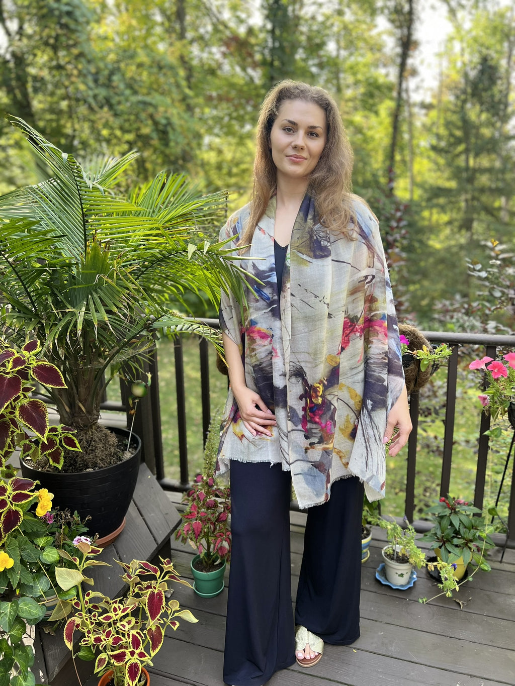 Model wearing the Gray and White Abstract Wool Scarf outdoors