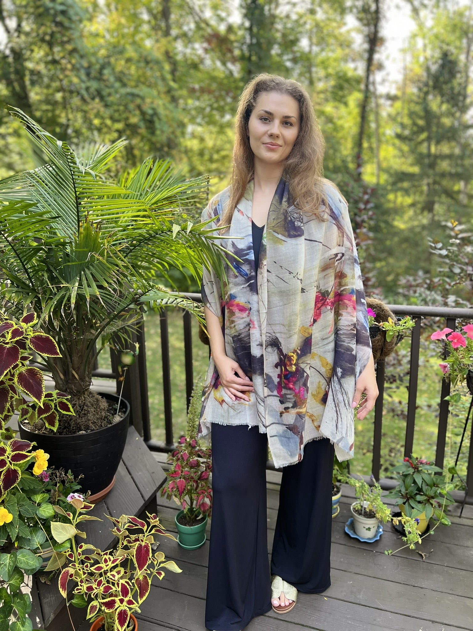 Model wearing the Gray and White Abstract Wool Scarf outdoors