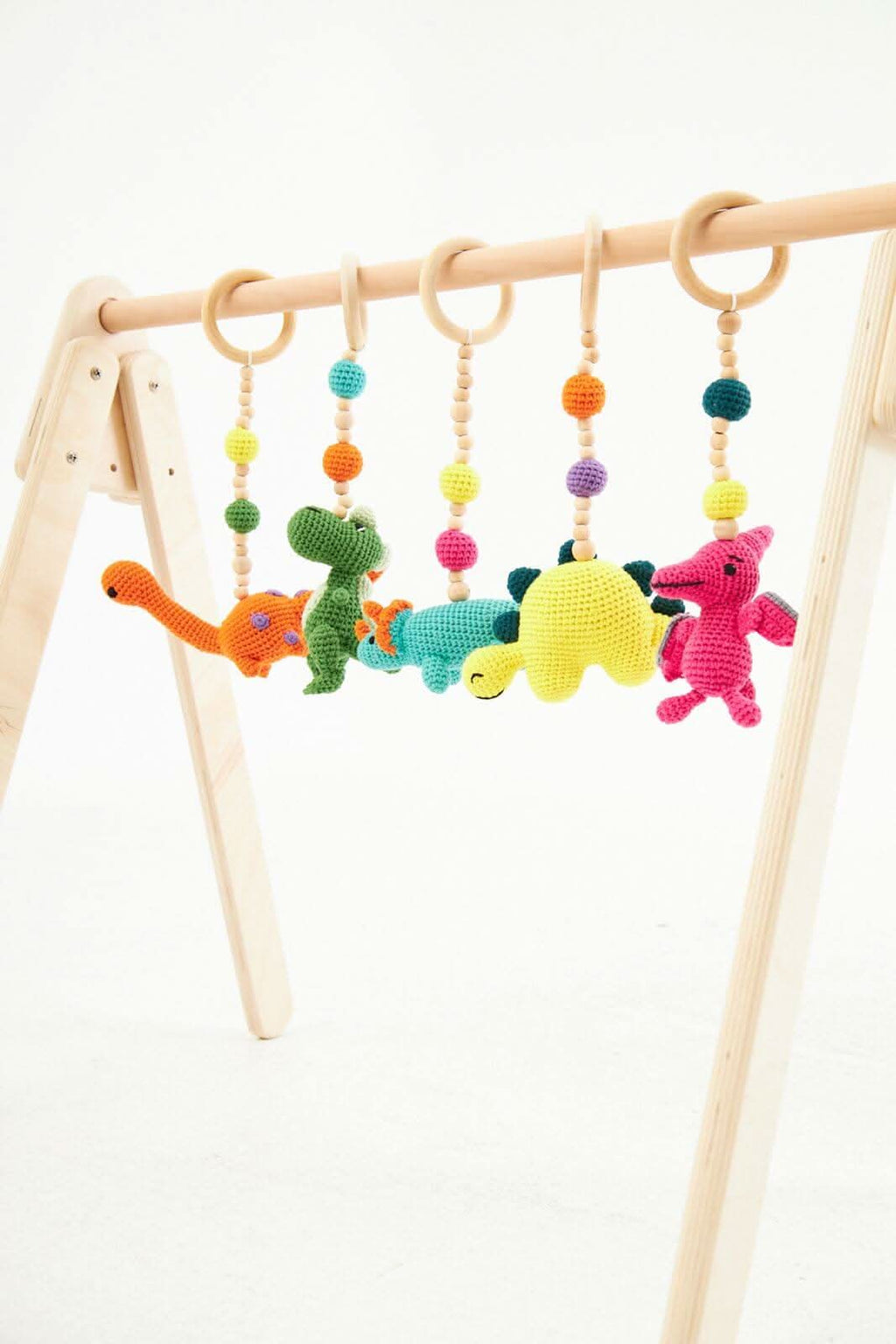 Back view highlighting stable legs of Montessori Baby Play Gym by Kidodido