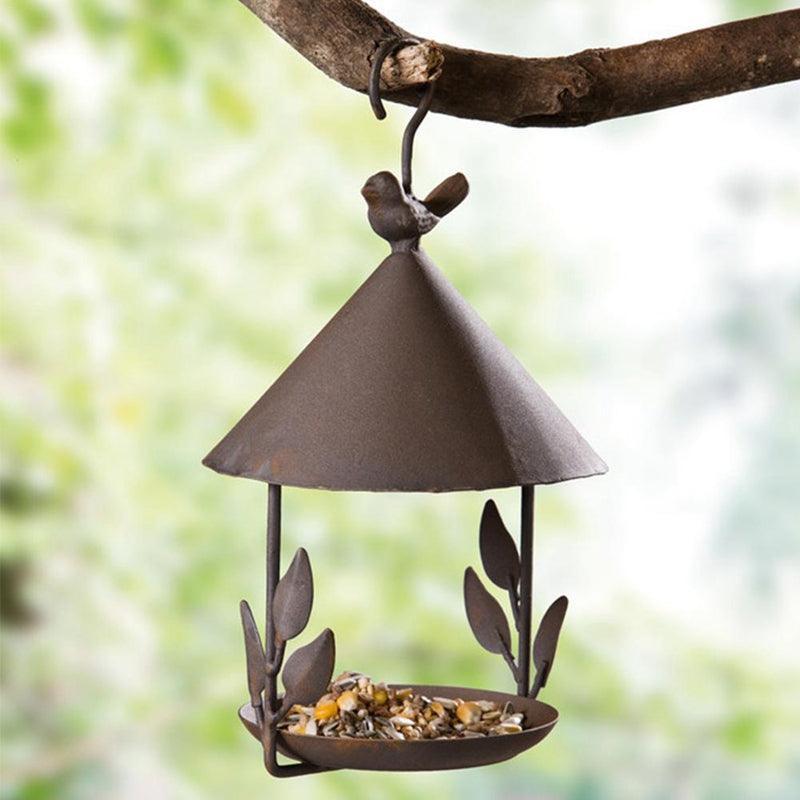 Elegant Iron Aviary Bird Feeder hanging in a garden
