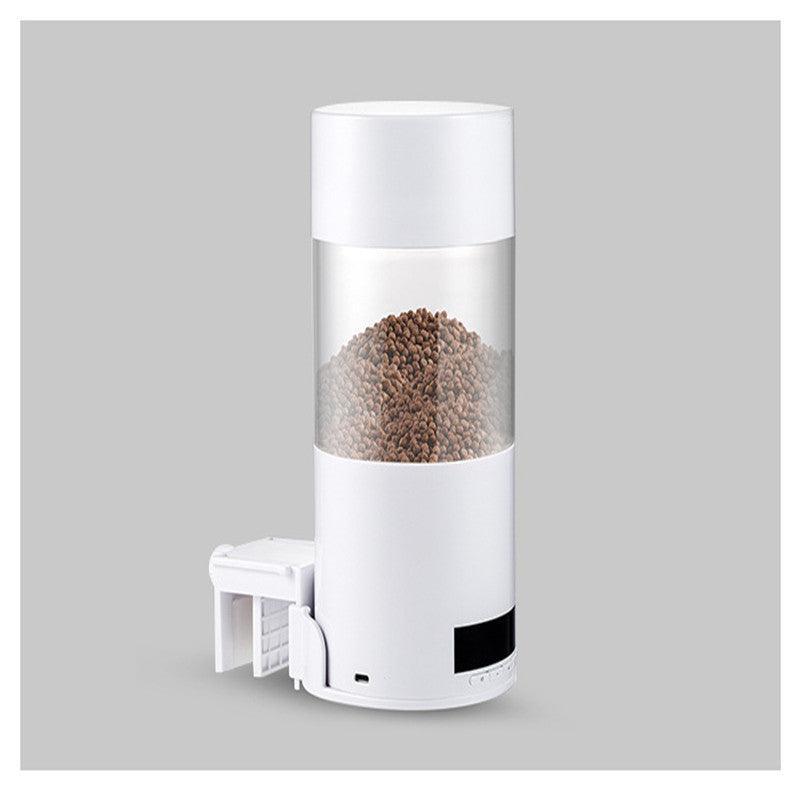 Smart Automatic Fish Feeder installed in a vibrant aquarium setup