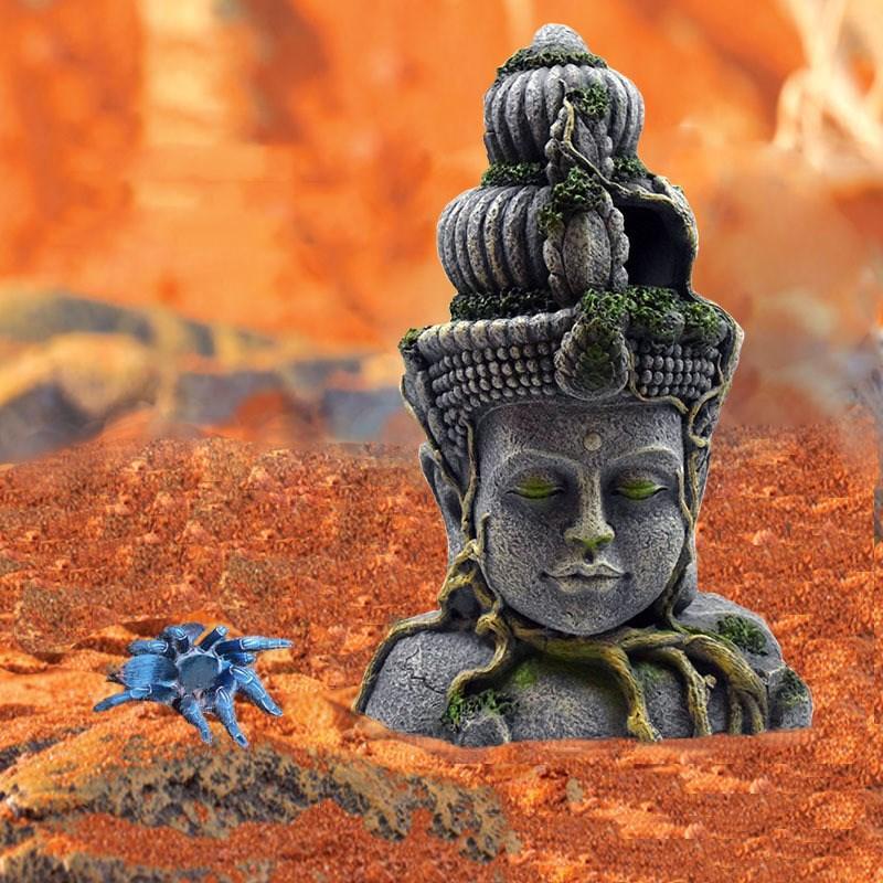 Bodhisattva Head Resin Decor placed in an aquatic tank setting