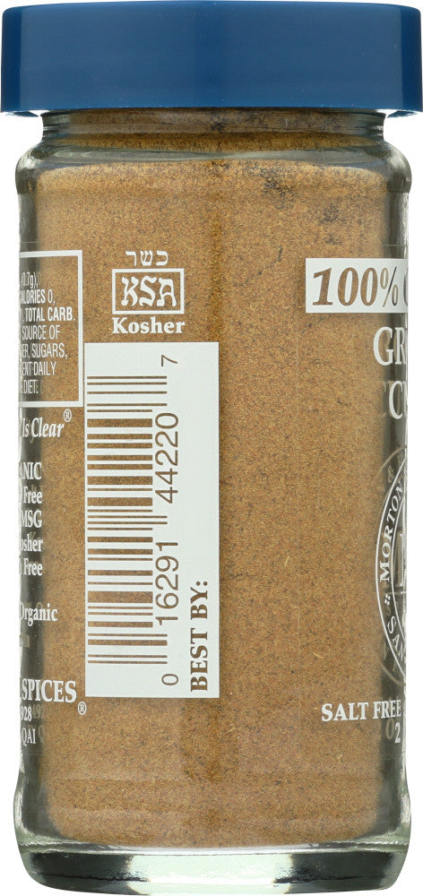 Close-up of organic ground cumin spice powder in a bowl by Morton & Bassett