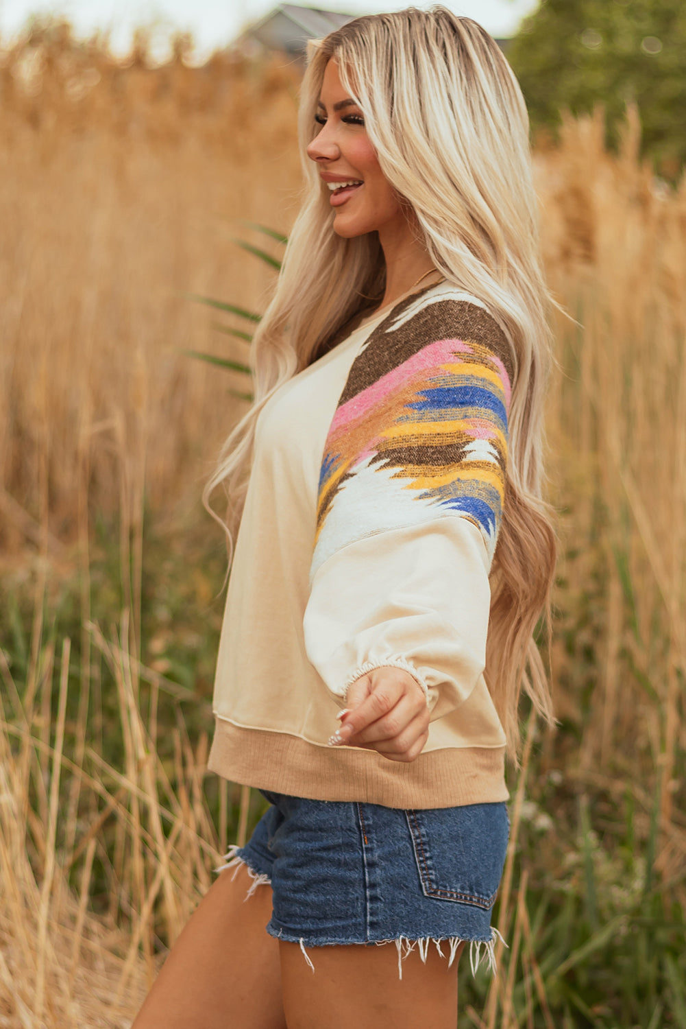 Back view of Logan Aztec Patchwork Pullover displaying cozy fit by Threaded Pear