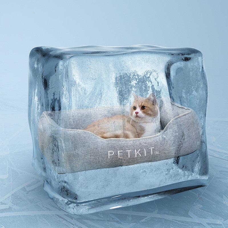 Pet relaxing on the Ultimate Summer Pet Cooling Mattress in a sunny outdoor setting