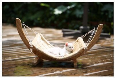 Stylish Wooden Cat Hammock Bed placed in a modern living room setting