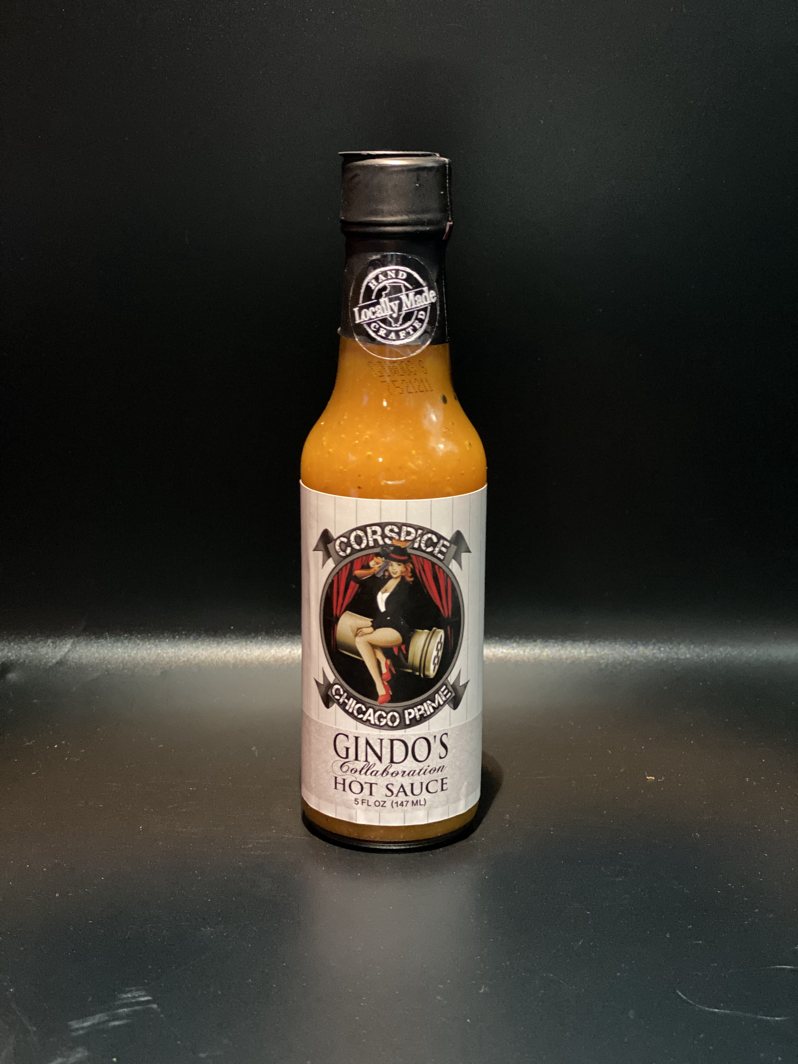 Bottle of Chicago Prime Hot Sauce by Corspice showcasing spicy flavor
