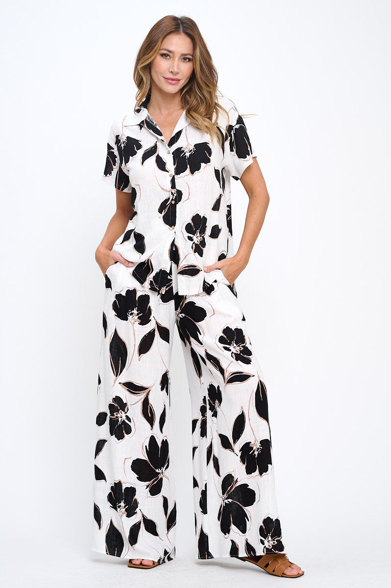 Flat lay of Elegant Floral V-Neck Short Sleeve Top in multiple colors by Reneecollection