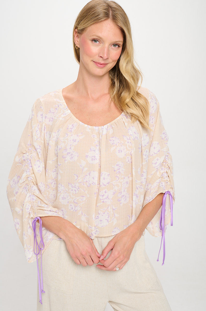 Front view of Elegant Floral Boat Neck Top in vibrant colors by Reneecollection