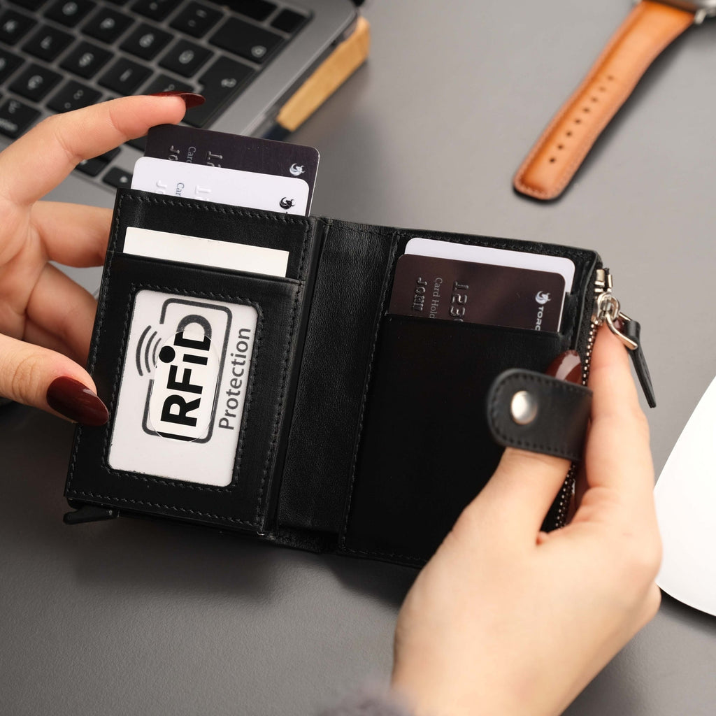 Lifestyle shot of Glenrock Black Leather Pop-Up Wallet in use