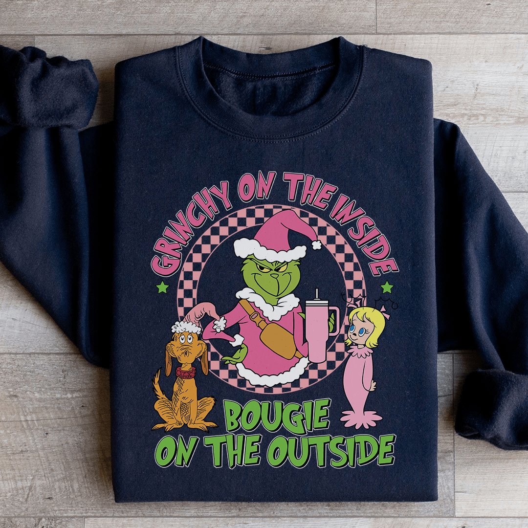Model wearing Grinchy On The Inside hoodie in casual setting