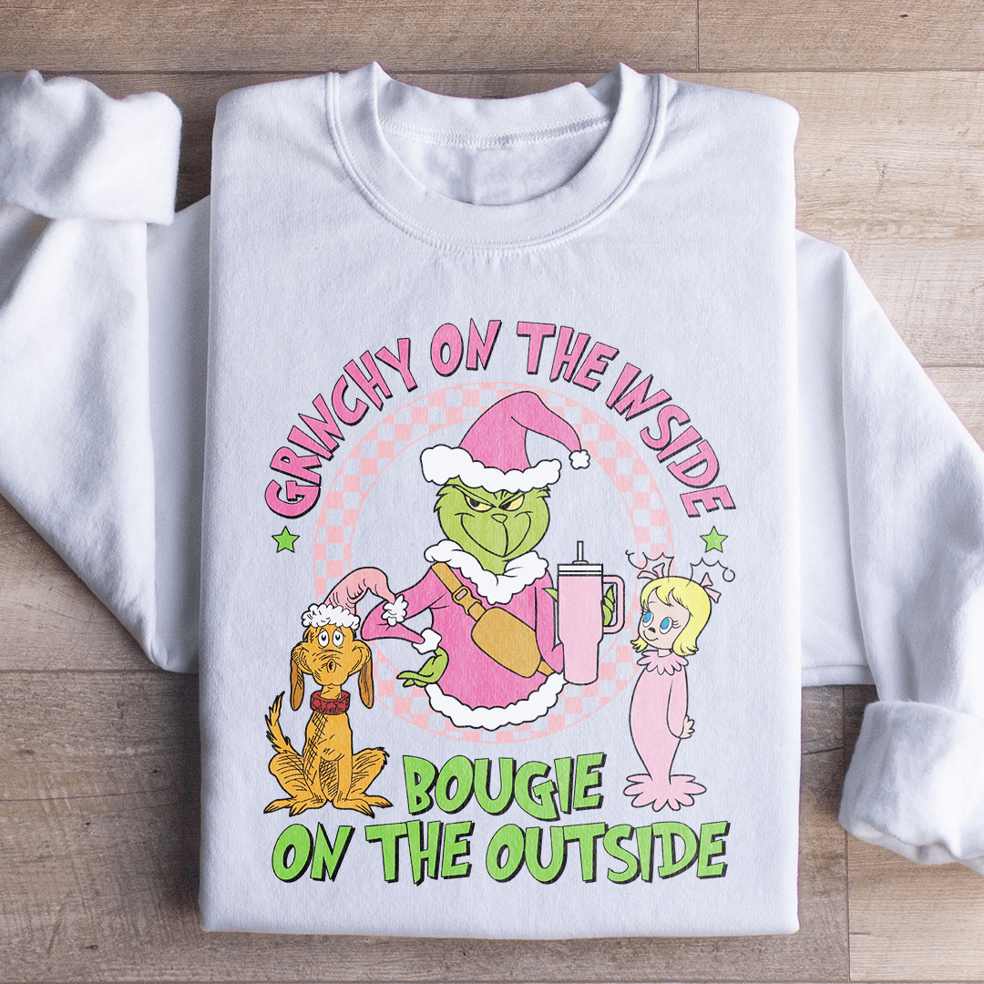 Side view of Grinchy On The Inside cozy sweatshirt featuring adjustable cuffs