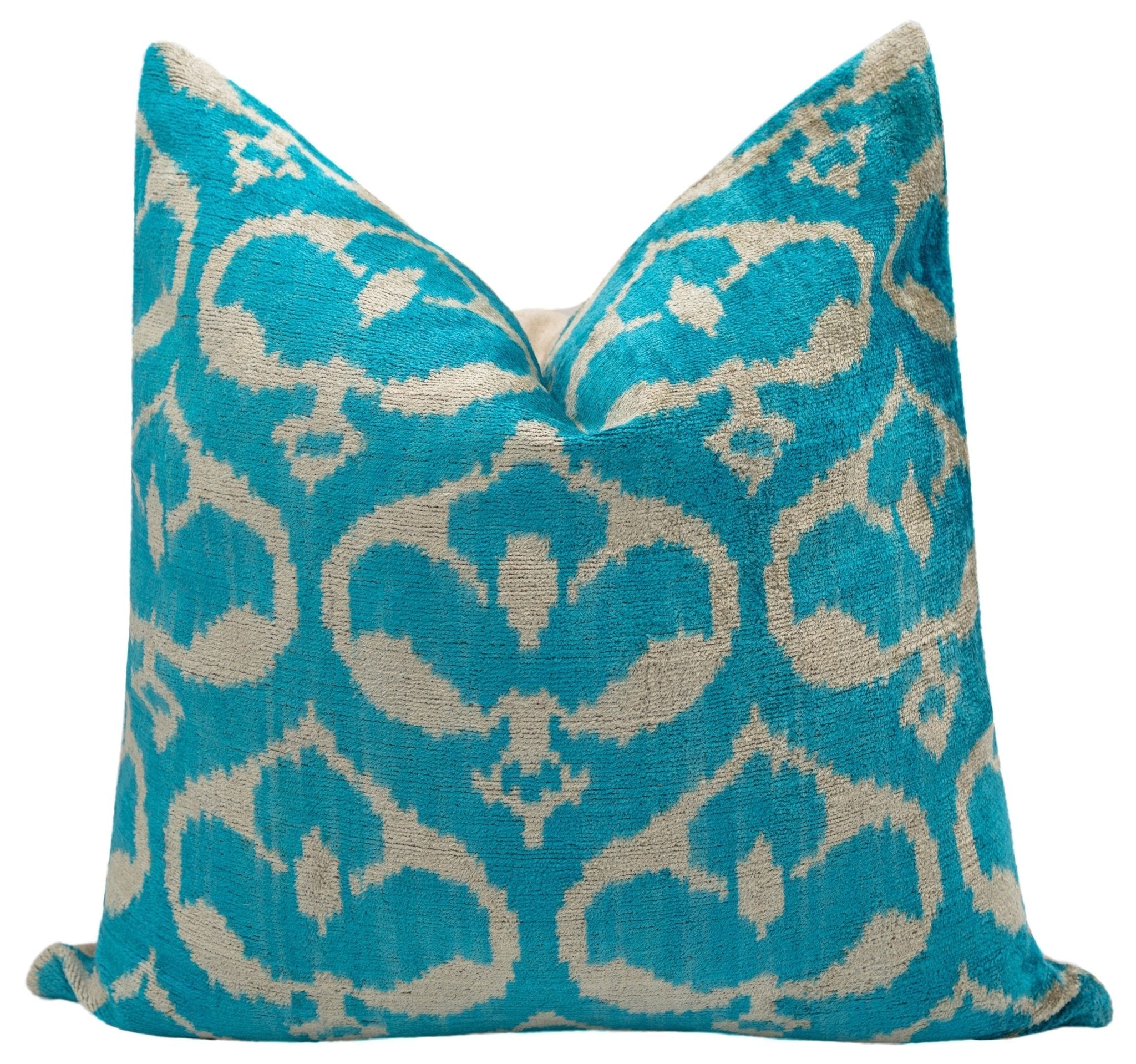Front view of Elegant Turquoise Ikat Velvet Throw Pillow by Canvello