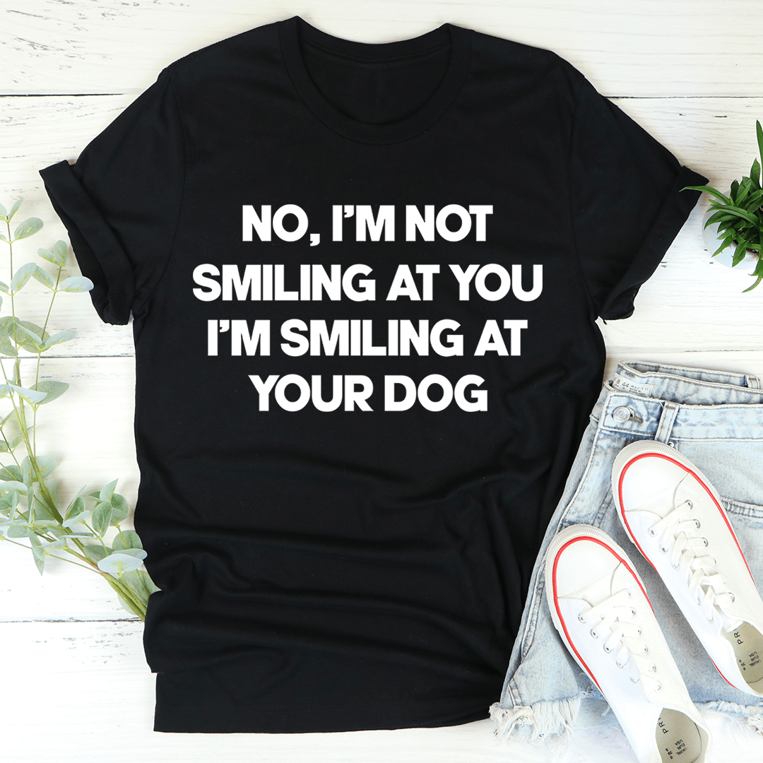 Front view of I'm Smiling At Your Dog T-Shirt by MerchMallow in white