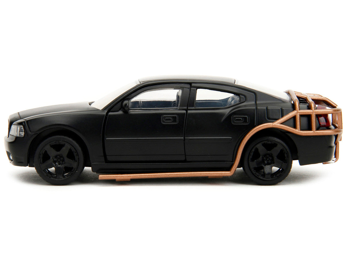Side profile of Matt Black 2006 Dodge Charger diecast model by Jada