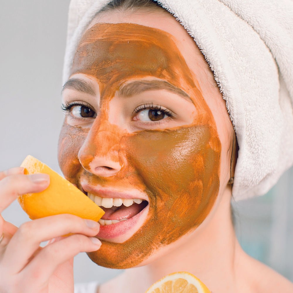 Organic Pumpkin AHA Face Mask applied on model's face