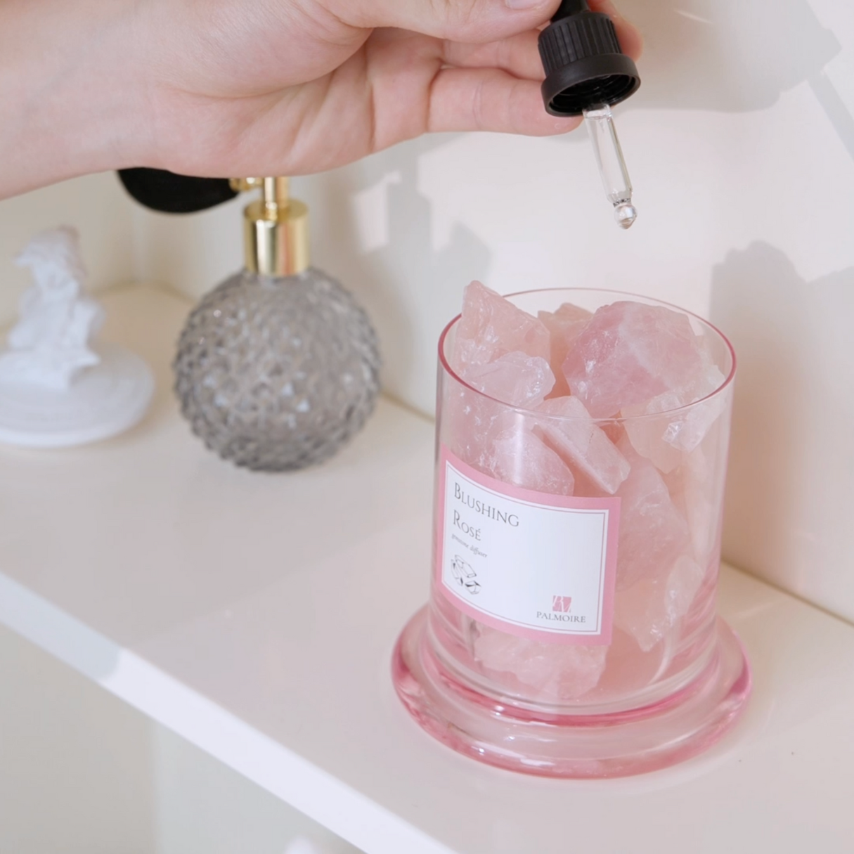 Blushing Rosé Gemstone Diffuser illuminating a cozy living room