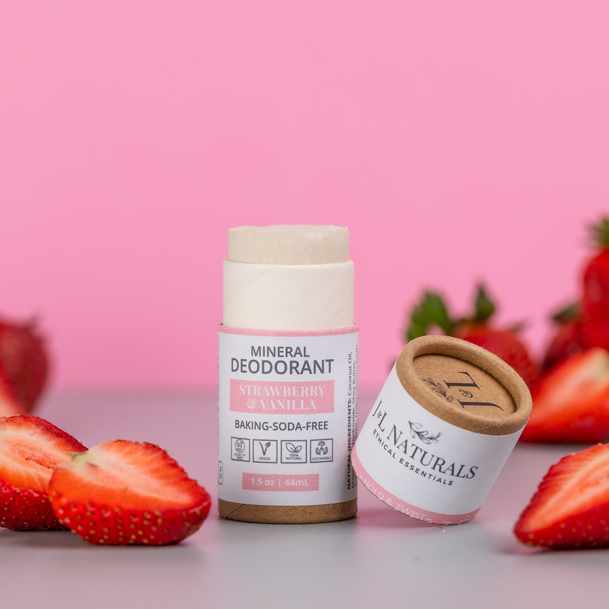 Gentle Mineral Deodorant Travel Pack by J&L Naturals beside a passport